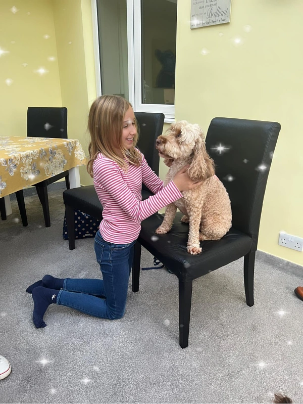 Little girl with dog